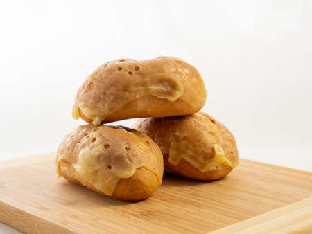 Bun with cheese. Fresh buns stuffed with cheese. Freshly baked cheese buns.の写真素材