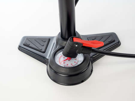 Bicycle pump on a white background. Bicycle wheel pumpの写真素材