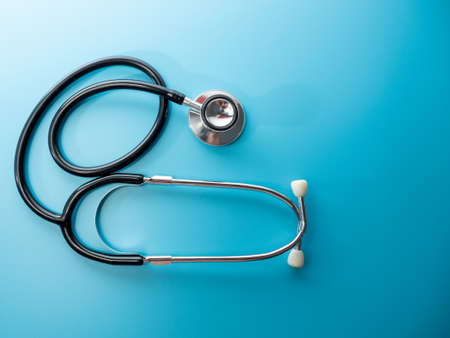 Medical stethoscope. Stethoscope on a blue background close up.の写真素材