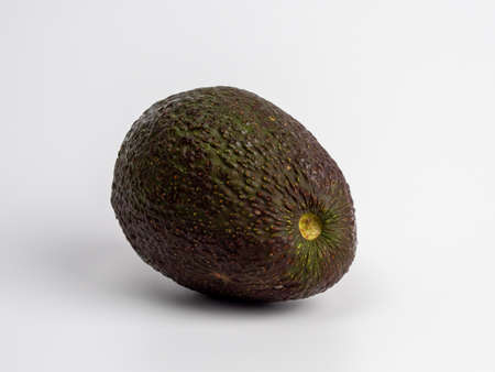Avocado on a white background. Close up. Fresh avocado.
