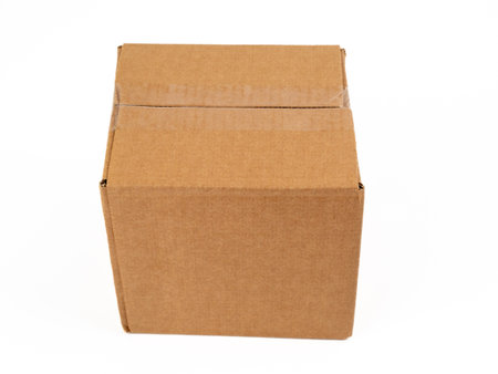 Cardboard box on a white background. Closed cardboard boxes. close up.の写真素材
