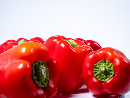 Red bell pepper on a white background. Red fresh pepper. Close up.の写真素材