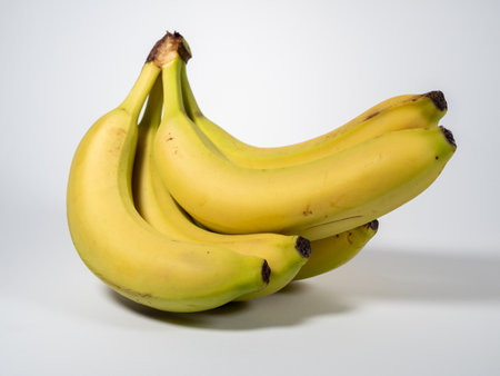 Banana on a white background. Ripe bananas on a light background. Close up.の写真素材