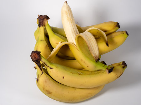 Banana on a white background. Ripe bananas on a light background. Close up.の写真素材