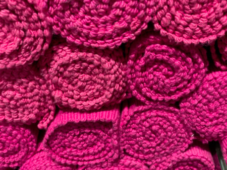 Fabric background. Folded fabric on a shelf. Close up.の写真素材