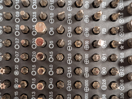 Universal set of screwdriver bits with different bits. Close up bit set.