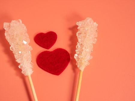 Red color heart on a pink background. Valentine's day concept.の写真素材