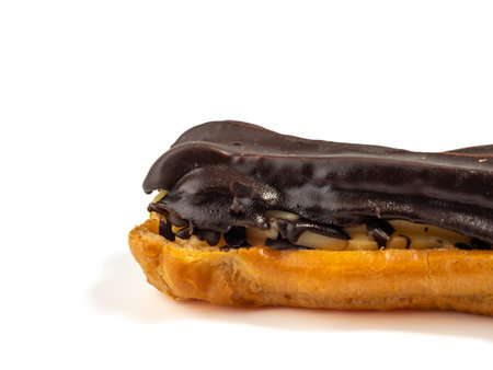 Delicious chocolate eclairs isolated on white background. Eclairs close-up.