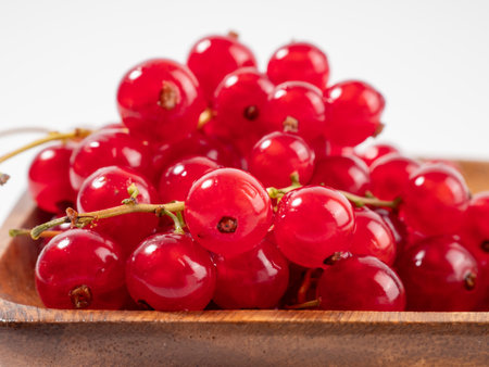 Ripe red currant on a light background. Currant closeupの写真素材