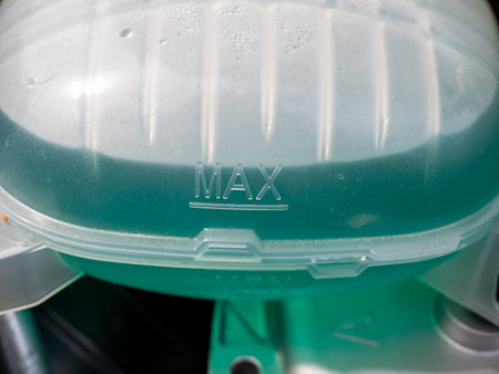 Tank of liquid antifreeze of the cooling system of the car radiator system. Tank with antifreeze...
