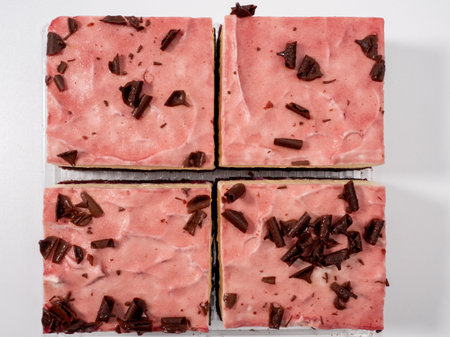 Cherry cake with chocolate on a white background. Cream cake with cherries and chocolate.