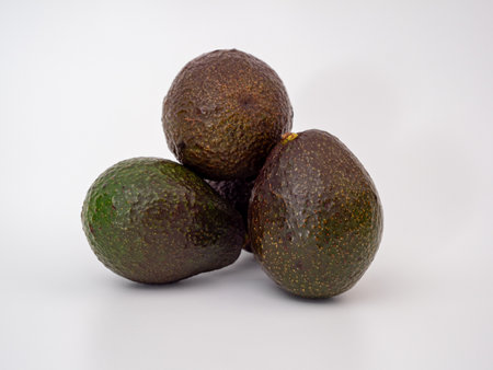 Fresh avocados on a white background. Avocado close up.の写真素材