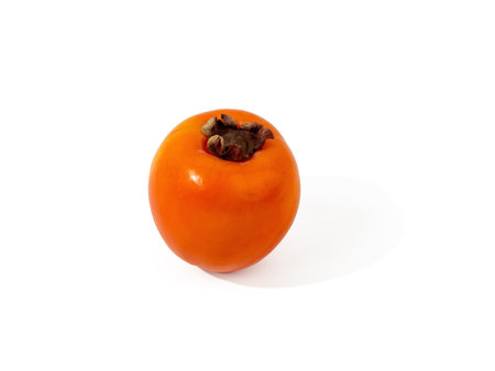 Ripe orange persimmon fruits isolated on a white background. Persimmons on white.の写真素材