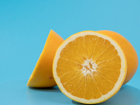 Ripe oranges on a blue background. Oranges on blue.の写真素材