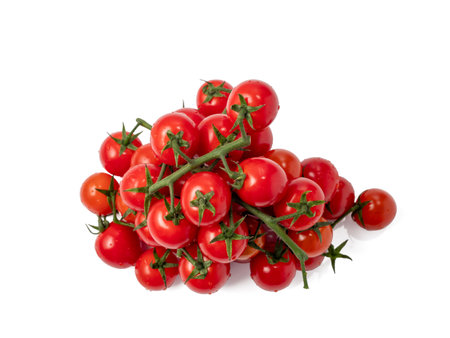 Ripe cherry tomato isolated on white background. Small tomatoes close up.の写真素材