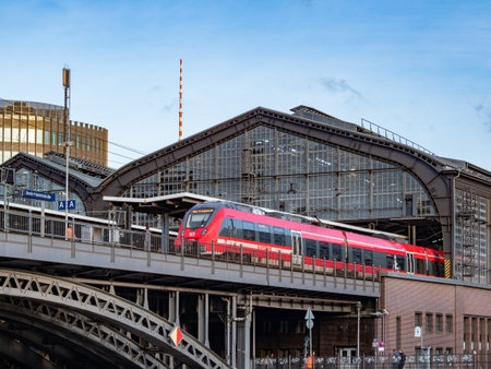 Berlin, Germany, February 10, 2024. Trains arrive over the iron bridge over the river at Friedrichstrasse station. Berlin, Germany, February 10, 2024のeditorial素材