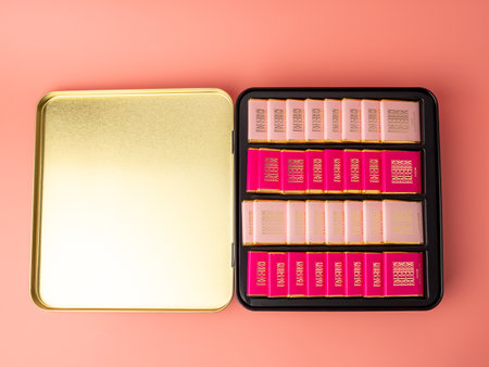 Berlin, Germany, February 25, 2024. Box of chocolates Fauchon on a pink background. Chocolate candies close-up. Berlin, Germany, February 25, 2024.のeditorial素材