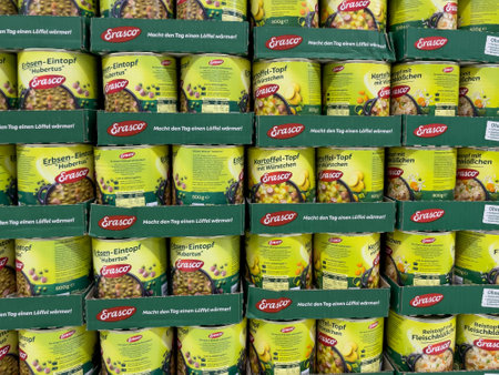 Germany Berlin September 4, 2024. A stack of green Erasco food cans. The cans are stacked on top of each other.のeditorial素材
