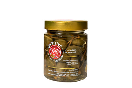 Germany Berlin November 4, 2024. A jar of capers with a red label. The jar is full and has a gold lid.のeditorial素材