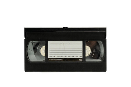 Black VHS cassette with white label. Video Cassette on a white background.