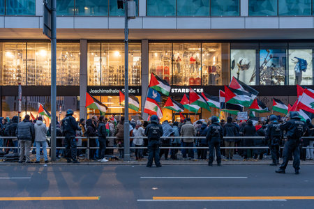 Germany Berlin November 16, 2024. Palestinian Flags Held and Large Group of Protesters. And the...