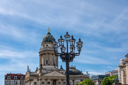 Old street lamp against the background of an old building with a dome. European old buildings.の写真素材