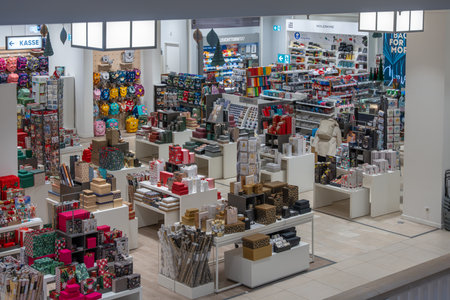Germany Berlin December 3, 2025. High-angle view of a gift and stationery department packed with displays. Holiday shopping scene with wrapping paper, boxes, and seasonal items.のeditorial素材