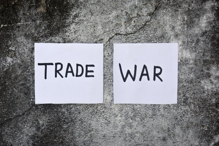 Trade war word text on old wall backgroundの写真素材