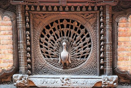 Peacock windows in the city of Bhaktapurの写真素材