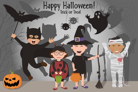 Funny kids in costumes celebrating Halloween on the background of ominous shadows. Halloween.のイラスト素材