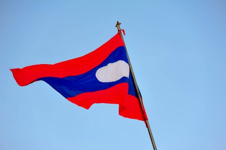 lao flag in the blue skyの写真素材
