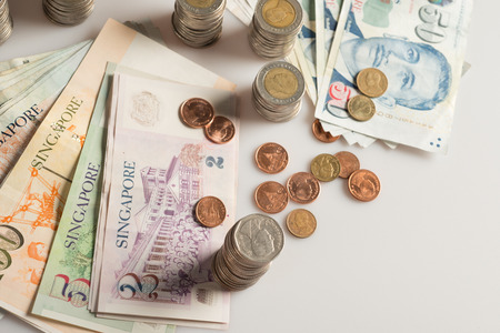 a collection of various currencies from countries the globe in white background