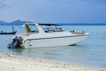 Speed boat in open blue seaの写真素材
