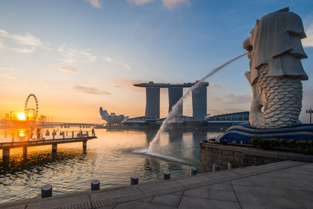 Sunrise in The Merlion fountain in front of the Marina Bay Sands hotelのeditorial素材