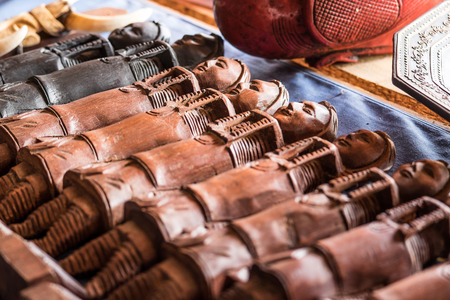 Jewelry and figurines in the boatの写真素材