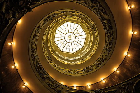 VATICAN - MARCH 24 : Spiral stairs of the Vatican Museums in Vatican on MARCH 24, 2015 in Rome, Italy.のeditorial素材