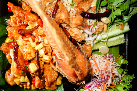 Thai Food,Fried fish with spicy toppings.の写真素材
