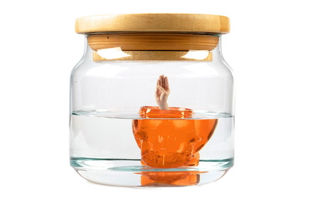 Water jar and skull isolated on whiteの写真素材