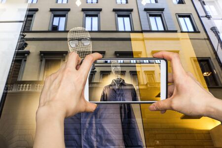 Girl taking pictures on mobile smart phone Portrait of The Invisible man with black glasses