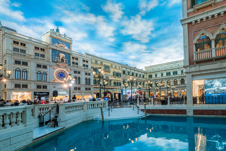 MACAU CHINA-JANUARY 11 visitor on gondola boat in Venetian Hotel The famous shopping mall luxury hotel landmark and the largest casino in the world on January 11,2016 in Macau Chinaのeditorial素材