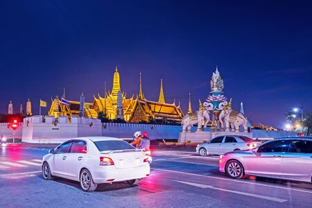 Traffic jam Wat Phra Kaew (The Emerald Buddha) night view in Thailandの写真素材