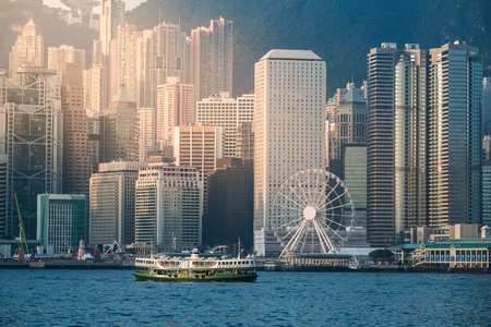 Hong Kong's Victoria Harbour in sunriseの写真素材