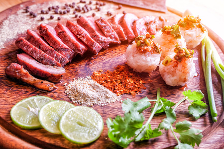 Thai style BBQ grill Meat and Sticky rice with spicy sauce.の写真素材