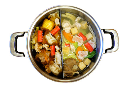 Double flavor hot pot on white background