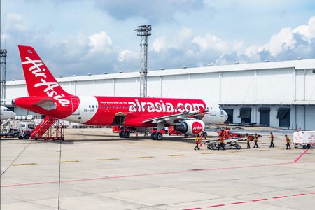 BANGKOK - September 7: In daylight Commercial aircraft wait for taking off at Don Muang international airport on September 7, 2016 in Bangkok, Thailand.のeditorial素材