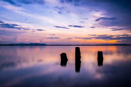 Island in the ocean at the sunsetの写真素材