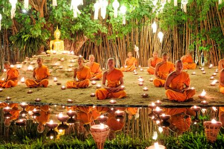 CHIANG MAI THAILAND - NOVEMBER 14 : Buddhist monks praying for the Loy Krathong festival at Wat Phan Tao on November 14, 2016 in Chiang Mai, Thailand.のeditorial素材