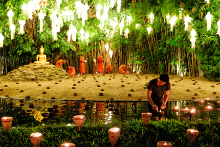 CHIANG MAI THAILAND - NOVEMBER 14 : Buddhist monks praying for the Loy Krathong festival at Wat Phan Tao on November 14, 2016 in Chiang Mai, Thailand.のeditorial素材