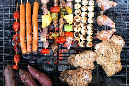 Top view low cost bbq outside cookingの写真素材