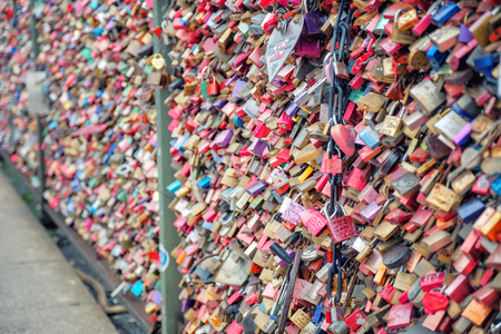 COLOGNE, GERMANY - MARCH 26: One of the main tourist attractions is the colorful love padlocks across the Hohenzollern Bridge on March 26, 2017 in Cologne.Germanyのeditorial素材